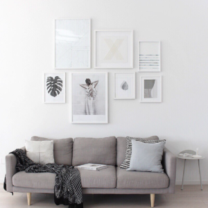 grey sofa and white wall art